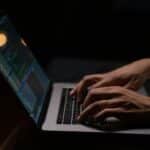 person-using-silver-and-black-laptop-computer