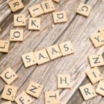 scrabble-letters-spelling-saas-on-a-wooden-tabl